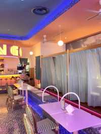 Neon-pink poolside bar-themed restaurant! 🦩💕