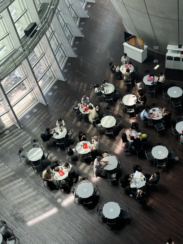 For a hot and humid summer date in Tokyo, visit the 'National Art Center'.