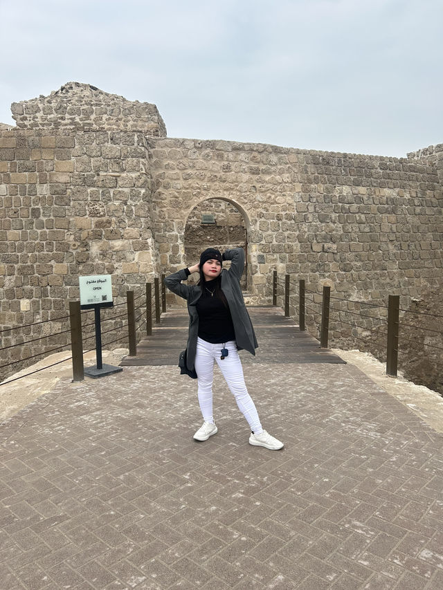 “Whispers of the Past: The Timeless Walls of Bahrain Fort”