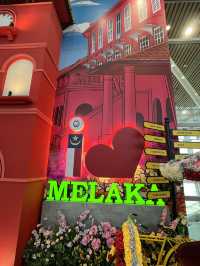 📸 Why is Melaka Red in the airport?! Heritage Vibes at KLIA1 – Melaka Corner!