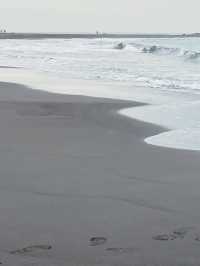 🏝️ Qijin Island Black Sand Beach: Where Volcanic Mystery Meets Ocean Poetry! 🌊