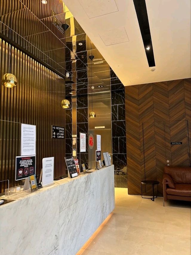 “Bugis Basecamp: Clean Comfort with Friendly Service”