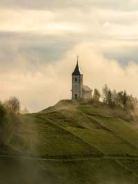 ⛪✨ “Heaven on a Hill: My Sunrise at Jamnik Church” 🌄📸
