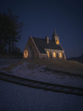 The scenery looks like it came straight out of a Nordic fairy tale book, 'Silverbell Church'.