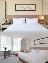 青島上合寶藏酒店!中式園林風+靜謐度假感,遛娃出差都適配