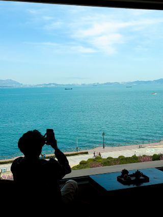 Dalian Donggang Seaview Hotel!! The view of the sea from the bed is absolutely amazing!!