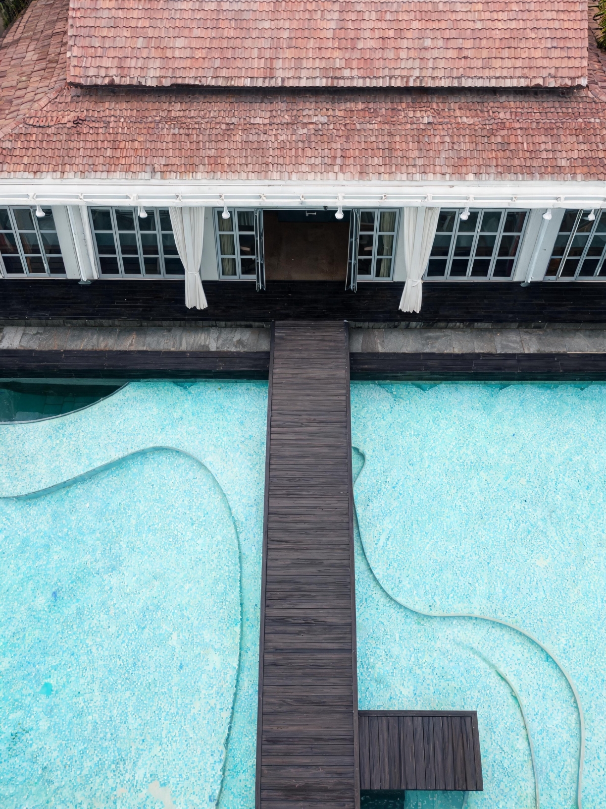 I stayed at a hotel on Mahé Island where you open the door to the ocean, and I was blown away.
