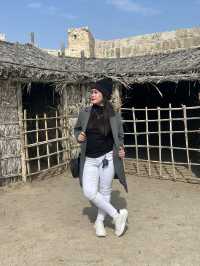 “Whispers of the Past: The Timeless Walls of Bahrain Fort”