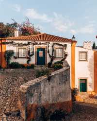 🏰✨ Enchanting Óbidos: A Fairytale Escape in Portugal! 🇵🇹🌺