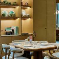 Curated Calm in a Glass-Framed Cocoon