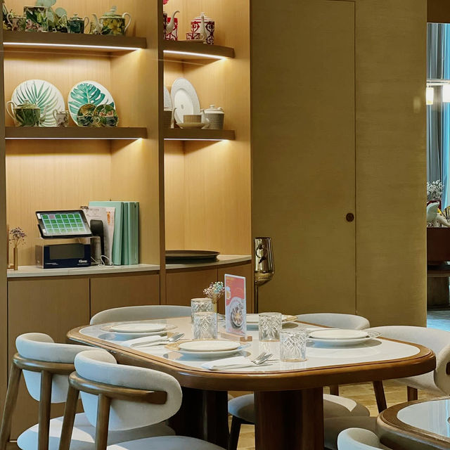 Curated Calm in a Glass-Framed Cocoon