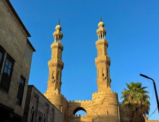 Stroll through the millennia-old corridor and explore the ancient twin gates of Zawiya