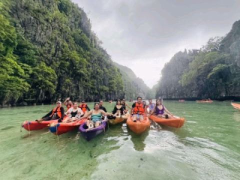 Exploring El Nido, Palawan was a family dream come true! 🏝️ Picture-perfect white sand beaches, swaying coconut trees, and crystal-clear waters made every moment feel like a paradise postcard. From mornings at El Nido Beach Hotel to afternoons zipping around on private boats, here’s how to make the most of your trip.

Top Spots to Visit in El Nido 🚤🌴

1. El Nido Beach Hotel (C. Hama)  
Wake up just steps from the beach and the bustling port—no need to waste time commuting! The sea view from the balcony is unmissable, and the staff goes above and beyond (even helping in emergencies). Take advantage of their laundry, massage services, and nearby restaurants. Just a heads up: some rooms might be affected by traffic or construction noise, so ask for a quieter spot when you book!

2. Island-Hopping Tours  
El Nido’s famous tours let you explore hidden lagoons, serene rivers, and majestic canyons. Pick a day with sunshine 🌞—or embrace the moody, cloudy skies for stunning photos among the coconut trees! Charter a private boat for a super personalized, fun experience with a friendly crew.

Personal Tips & Hacks 🏖️  
- Book your tours via trip.com for ease and reliability.  
- For food, try local beachfront grills—seafood here is next-level!  
- Bring cash, as some smaller eateries don’t take cards.  
- El Nido is open 24/7 but check opening details for specific attractions.  
- Weather flips from sunny to cloudy and rainy, so pack both sunscreen and a light rain jacket!

Getting Around  
El Nido is walkable, and tricycles are cheap for short hops. The pier for tours is less than 10 minutes away from major hotels.

#ElNidoAdventure #PalawanBeachLife #FamilyTravel #PhilippinesTrip #tripdotcom