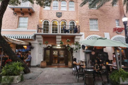 Check in at a century-old hotel in Miami! Immerse yourself in South American vibes