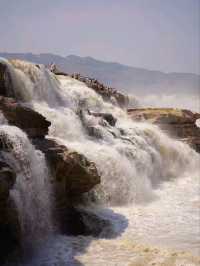 Hukou Waterfall: Nature's Majestic Power Unleashed