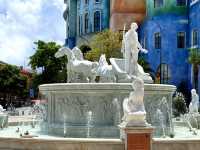 Pose Like a Roman at the Fountain of Sunset Town