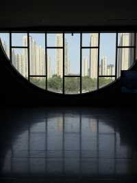 Stylish curvy Chinese museum about canal