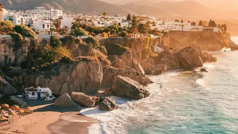Nerja — The Andalusian Town Where White Houses Meet Turquoise Coves and the Balcony of Europe Opens  — traveler post in Nerja