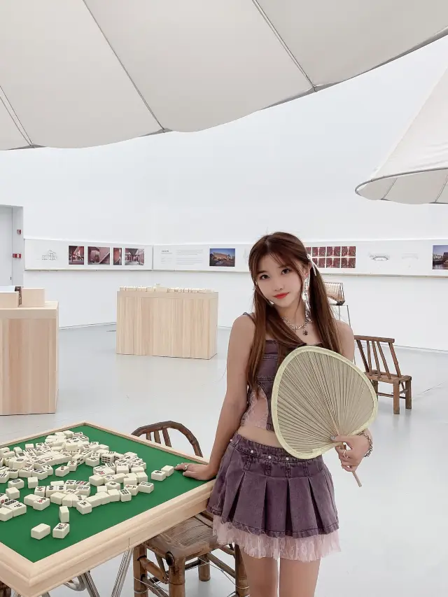 What's the experience of cooling off and playing mahjong in the museum in Magic City!
