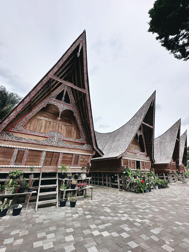 Standing Among the Ancestral Batak Houses of Huta Siallagan Standing Among the Ancestral Batak Houses of Huta Siallagan