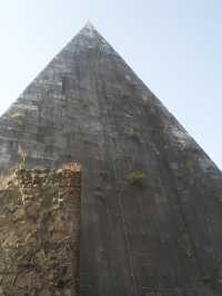 Pyramid of Cestius and authentic food Rome 