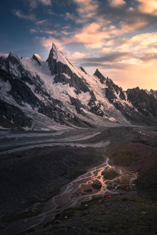 Light falls on the Karakoram snow-capped mountains