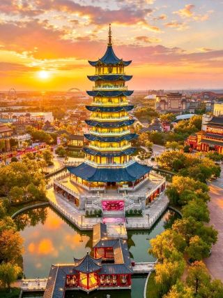 The ancient pagoda is beautifully lit up at night. ✨