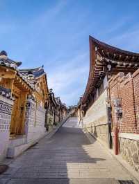 Bukchon Hanok Village: Time-Travel Through Seoul’s Most Photogenic Alleys"** 🏮🏡