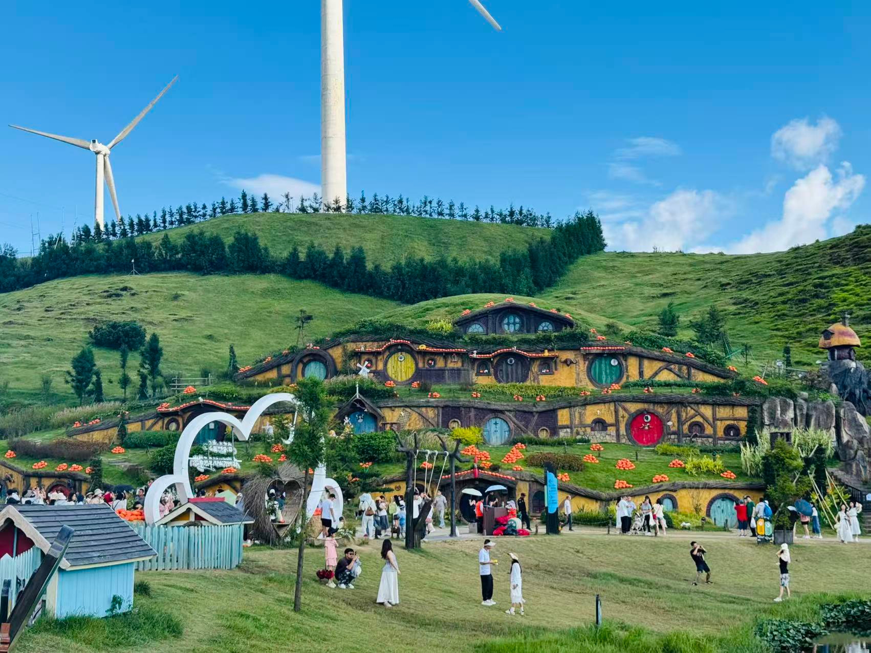 
Yangtianhu Grassland in Chenzhou completely took my breath away—it’s one of those rare places where photos just can’t do justice to the real beauty. Perched at 1,314 meters above sea level, this sprawling alpine meadow stretches endlessly under vast blue skies, dotted with giant white windmills that spin lazily in the cool mountain breeze. The highlight for me was the stunning volcanic crater lake at the center, its crystal-clear waters perfectly mirroring the clouds above, creating a scene so surreal it felt like a painting. I also loved exploring the whimsical Hobbit-style houses, feeding the adorable sika deer that roam freely, and trying the thrilling grass sledding that had my heart racing with joy. Every corner of this place offers a postcard-worthy view, and the peaceful atmosphere makes it a perfect escape from the city chaos. Whether you're a nature lover, a photography enthusiast, or just someone looking for a dreamy weekend retreat, this hidden gem in Chenzhou is an absolute must-visit. Trip.com made my booking seamless.#china #travel 