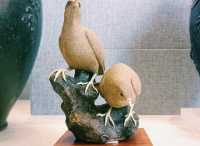 Guangdong Ceramic and Wood Carving Art