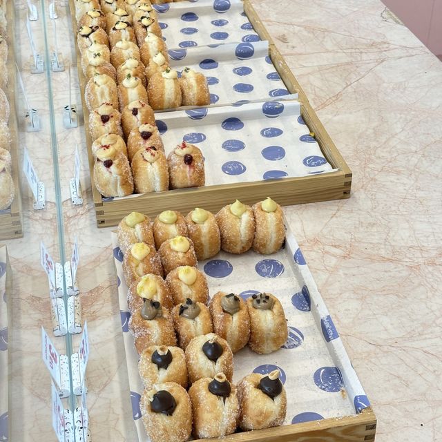 Check out this pretty bomboloni cafe!