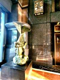 Heroic sculptures at ATLAS bar