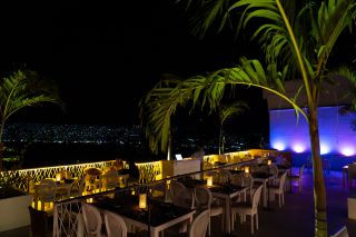Rooftop Views, Neon Rooms, and Dinner at MUNA