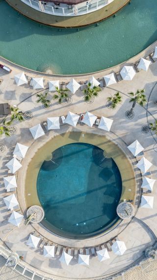 Top-Down Pools, Sunset Architecture, Buffet Flavors, Lunch, and Resort Views