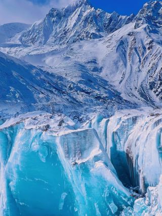 What colors are most stunning for photos in the blue ice cave? What is the best time to shoot?
