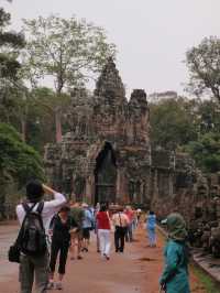 Whispers of Stone: A Morning at Bayon Temple