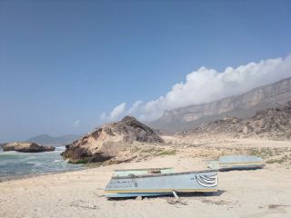 Al Fazayah Beach: Oman’s Wild Coastal Paradise 🏖️🐪