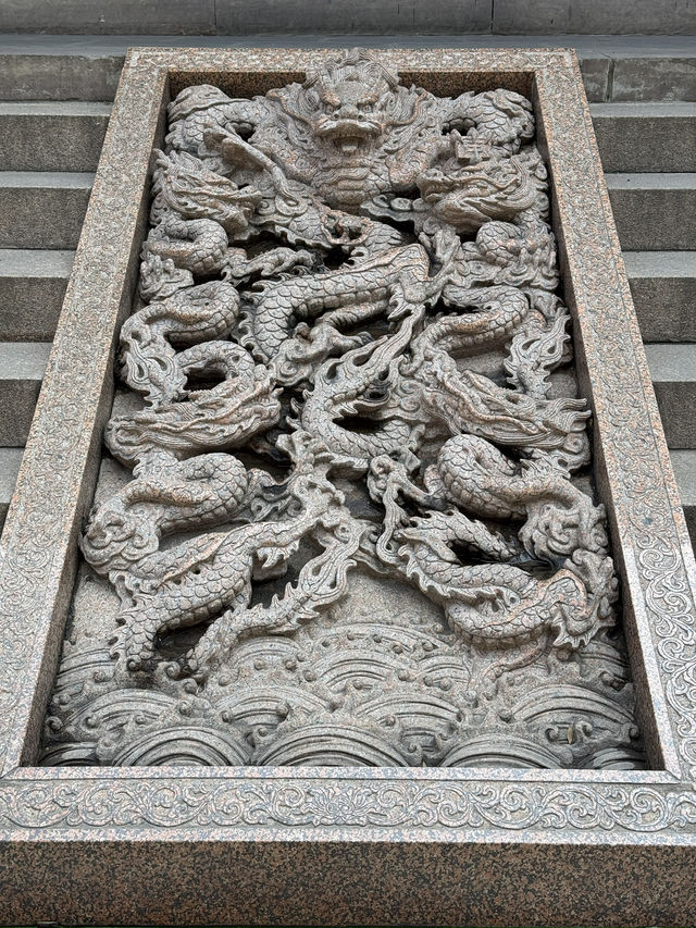 Serene temple next to busy Taikoo Li