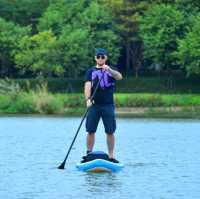 Glide & Gaze: Paddleboarding Bliss at Haizhu Lake Park 🏄‍♂️🌇