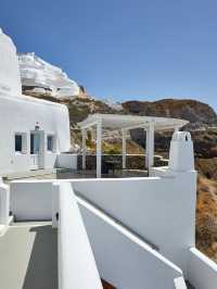 🌟 Santorini Charm: Stay at Petit Palace Suites 🏝️✨