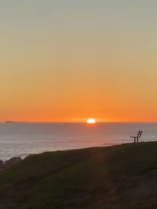 Sunset Stage Above the Coast