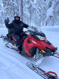 Snowmobiling trip in Rovaniemi 