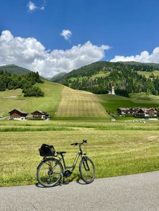 Crossing the Austrian border by bike from Dobbiaco