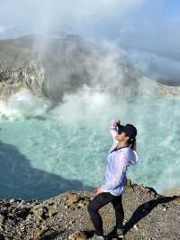 The Turquoise Crater Lake Above the Clouds