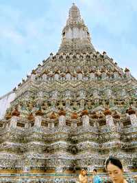 Admiring the beauty of Wat Arun in Thai Traditional Costume