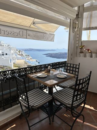 Fira's Seaside Restaurant: Average Taste, Stunning Views!