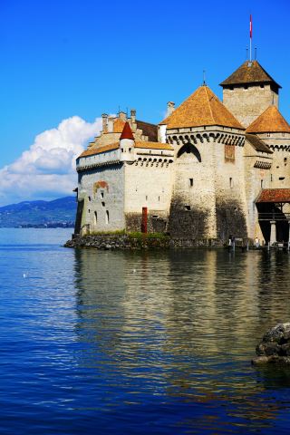 Chillon Castle on Lake Geneva: A beautiful blend of nature and history.