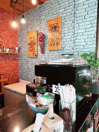 Kedai Teres Parapat: Cozy Orange-Hued Café with Aromatic Coffee & Weekend Vibes 