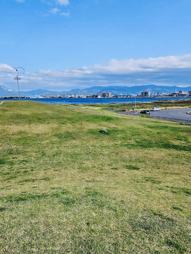 A peaceful waterfront space that offers breathtaking views of Mutsu Bay and passing cruise ships