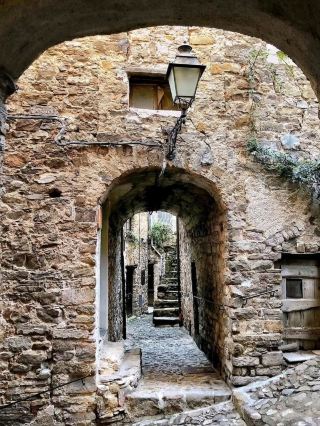  The Painted Silence of Apricale – Italy’s Timeless Hill Village